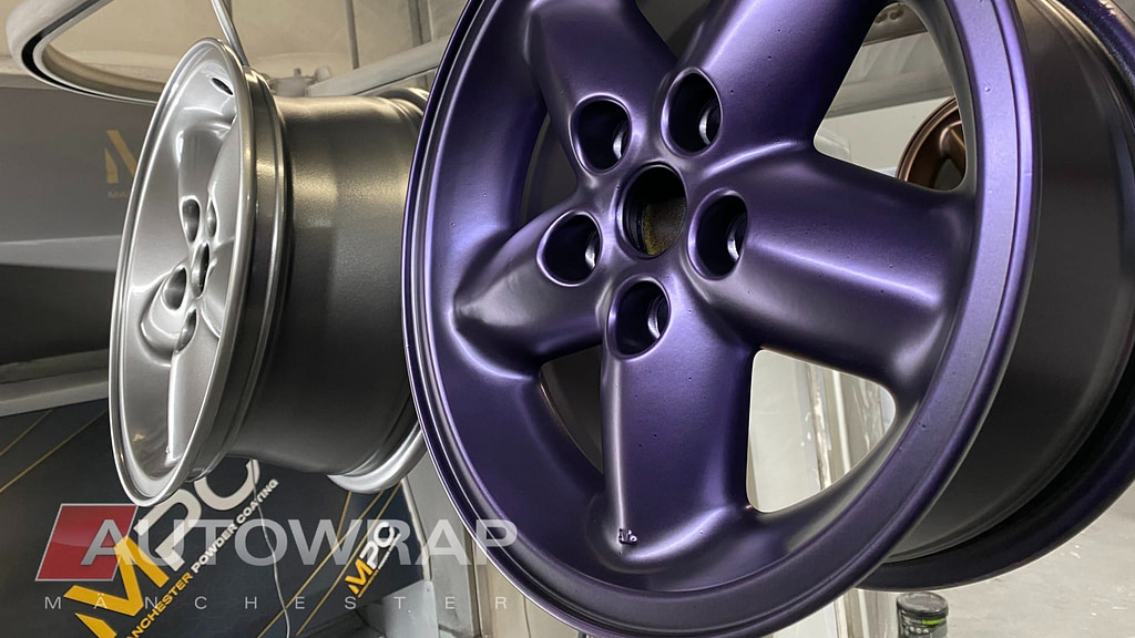 A wheel powder coated in a satin purple